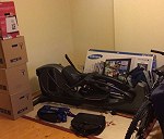 7 boxes + elliptical trainer + flat TV 46" + Mountain Bike + 3 bags