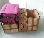 3 paczki, jedna walizka