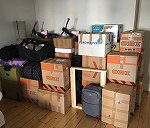 35 boxes, 1 tv, 2 bags, 2 bikes, 2 minibikes, 1 snowboard, 1 carpet, 1 TV Table.