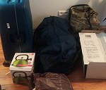 Mainly lugggage, but it includes a few glasses/cups and stoneware, plus a sewingmachine