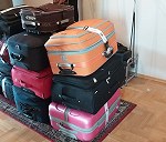 11 maletas, dos bicicletas y un saco con patinetes a España