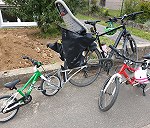 Jeden e-bike i dwa dzieciece rowery + torba podrozna